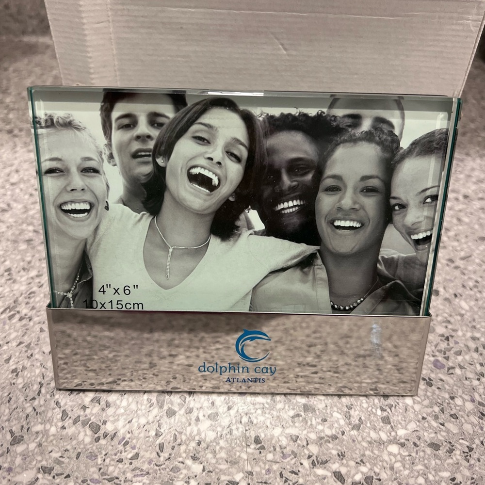 2 items: Atlantis Dolphin Cay Picture Frame & Picture Book